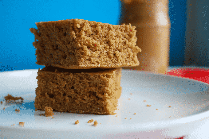 EASY and HEALTHY Peanut Butter Cake! This cake is low in calories, fat, and carbs, but PACKED with protein. Plus, it's delicious!