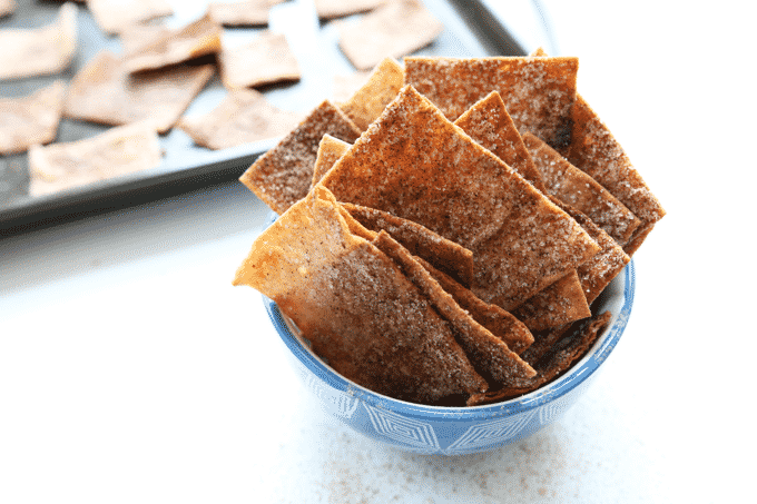 I'm totally obsessed with these healthy homemade cinnamon sugar pita chips. The recipe is unbelievably easy, and they're the perfect snack. You can also make Cinnamon Toast Crunch with them!