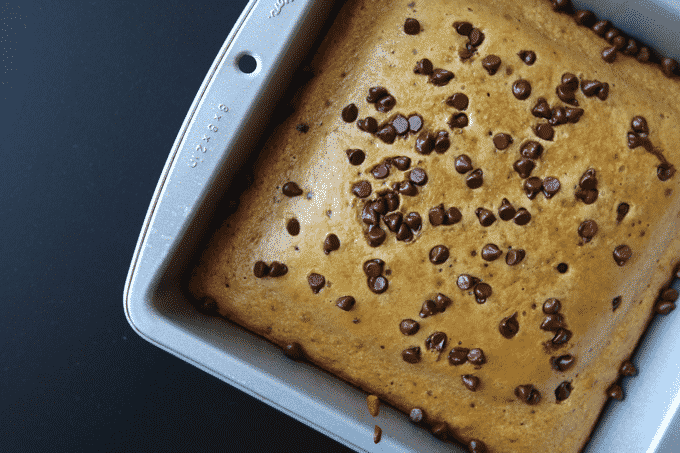 This Healthy Chocolate Chip Cookie Cake is packed with protein and low in calories - This cake is full of chocolate chip deliciousness without all the guilt.