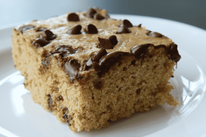 This healthy high protein Chocolate Chip Cookie Cake is a GAME CHANGER. Tons of chocolate chip cookie deliciousness, but none of the guilt!