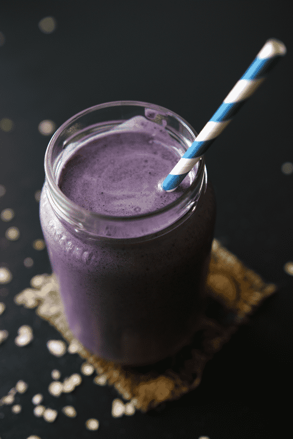 This healthy Blueberry Muffin Protein Shake packs 30g of protein per cup, is perfectly sweet, and ultra-thick. Plus, it's made with quick, easy, and healthy ingredients!