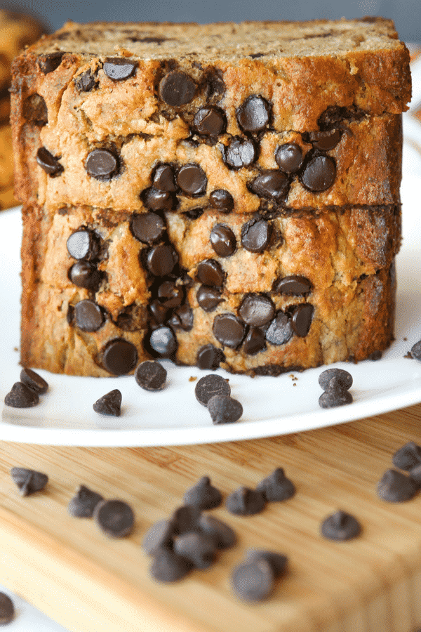 EASY HEALTHY MOIST Banana Bread! This is the BEST skinny chocolate chip banana bread recipe you'll every make. It makes for a great healthy snack, or even as a healthy breakfast idea.