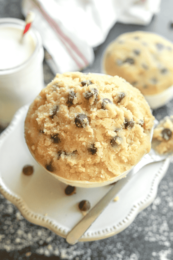 A bowl of cookie dough on a table