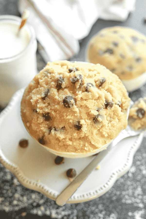 A bowl of cookie dough on a table