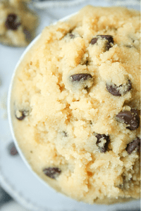 Up close view of cookie dough in a cup.