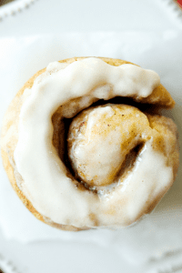 A keto cinnamon roll on a plate.