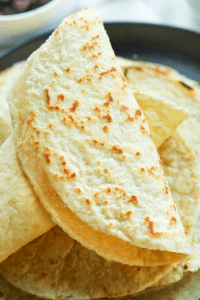 Keto Tortillas Made with almond flour. This is truly the BEST low carb tortilla recipe. Each one has just over 1 NET CARB, and you'd never guess these were keto.