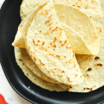 Keto Tortillas folded on a plate.