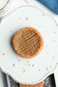 A peanut butter cookie on a plate.