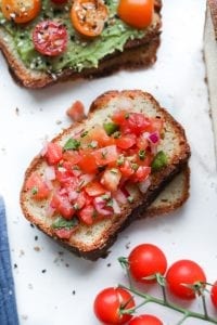 A slice of bread topped with salsa