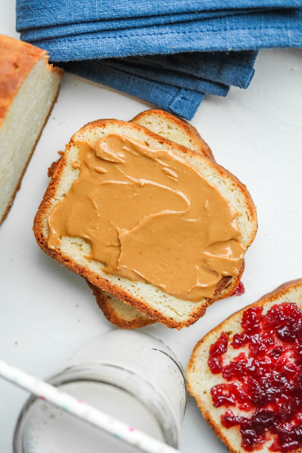 A slice of bread with peanut butter on it