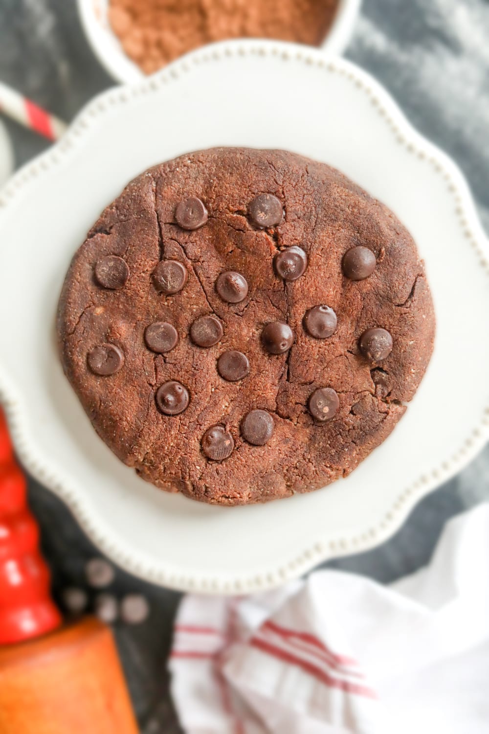 A keto double chocolate chip cookie on a plate.