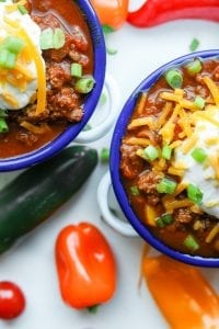 2 Bowls of chili next to each other.