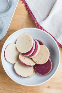 White chocolate raspberry keto fat bombs in a bowl