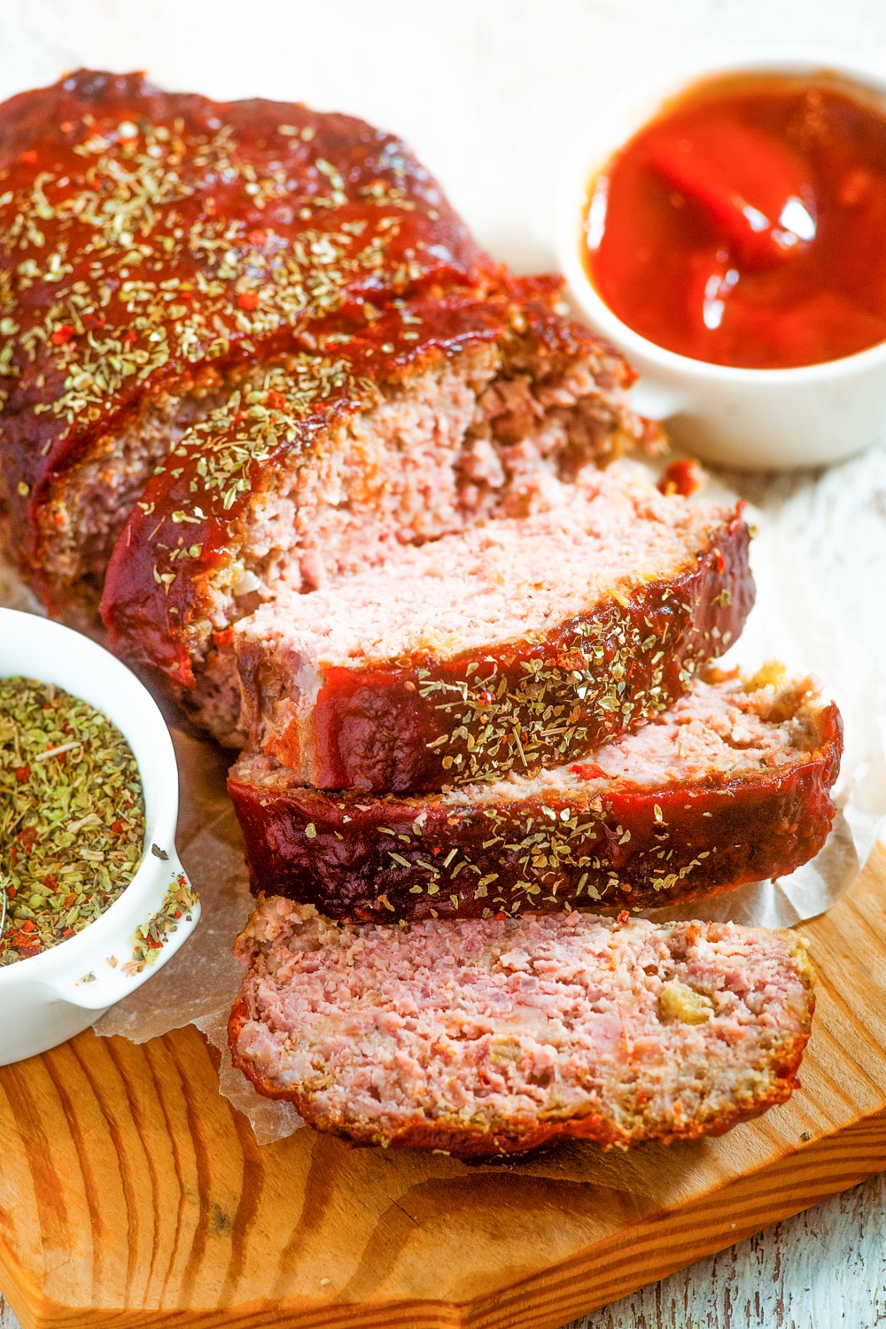 Slices of low carb meatloaf stacked on top of one another