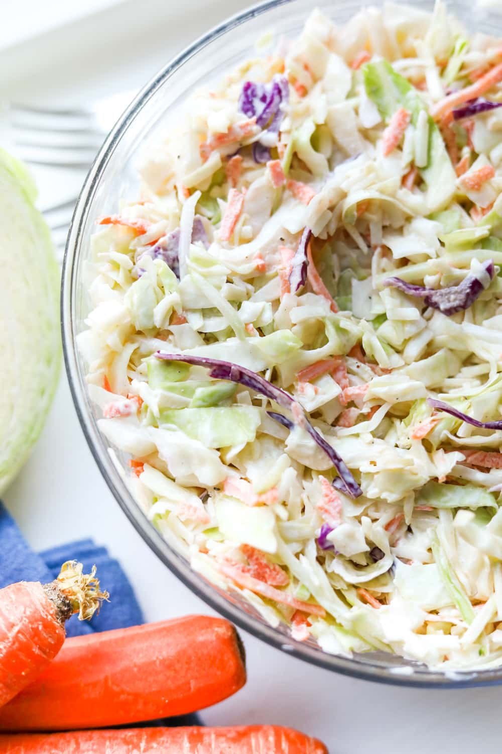 Keto coleslaw in a large glass bowl.