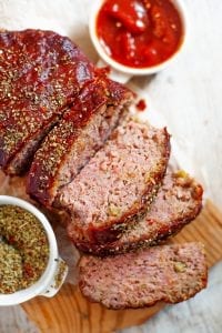 Slices of keto meatloaf on a cutting board.