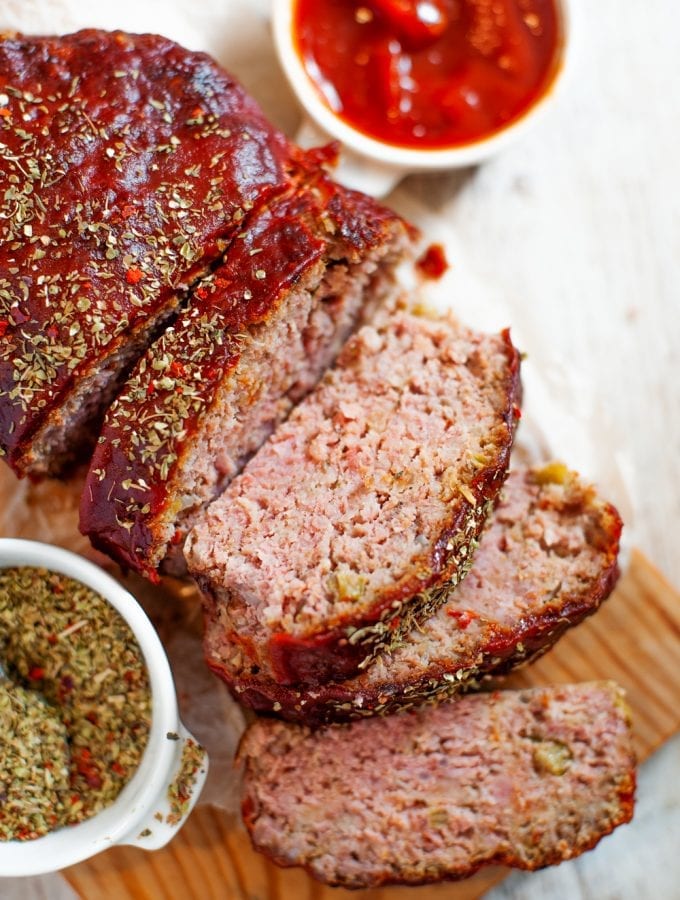 Slices of keto meatloaf on a cutting board.