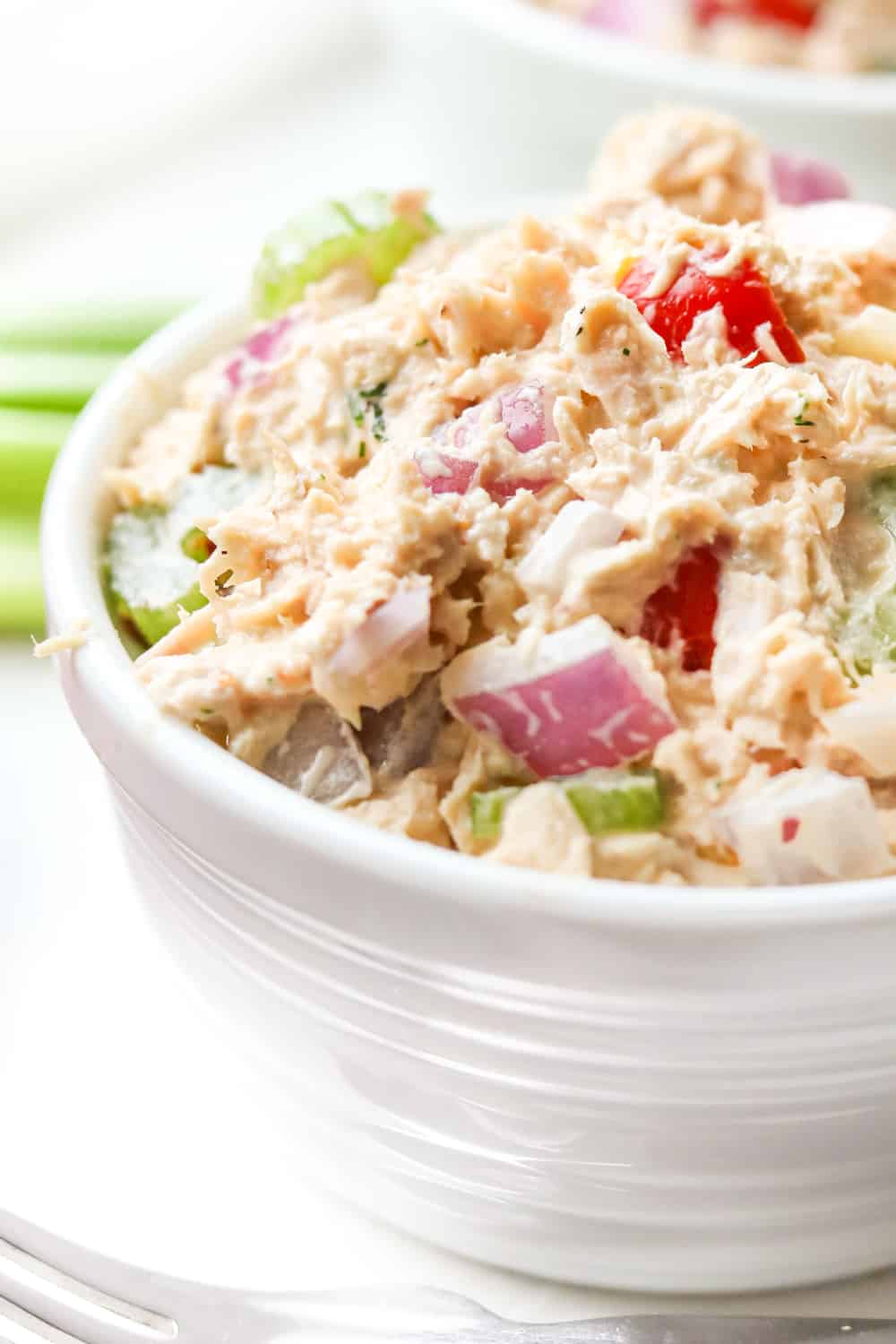 Tuna salad in a small bowl.