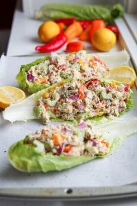 3 Keto chicken salad recipes on a tray with lemons.