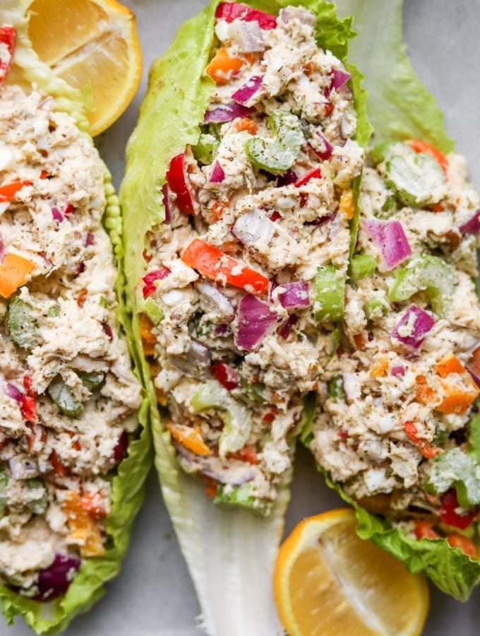 Chicken salad stuffed into 3 separate leafs of lettuce.