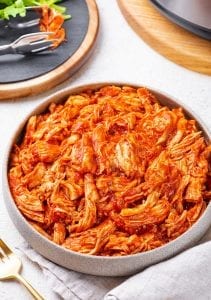 Shredded Chicken topped with BBQ sauce.