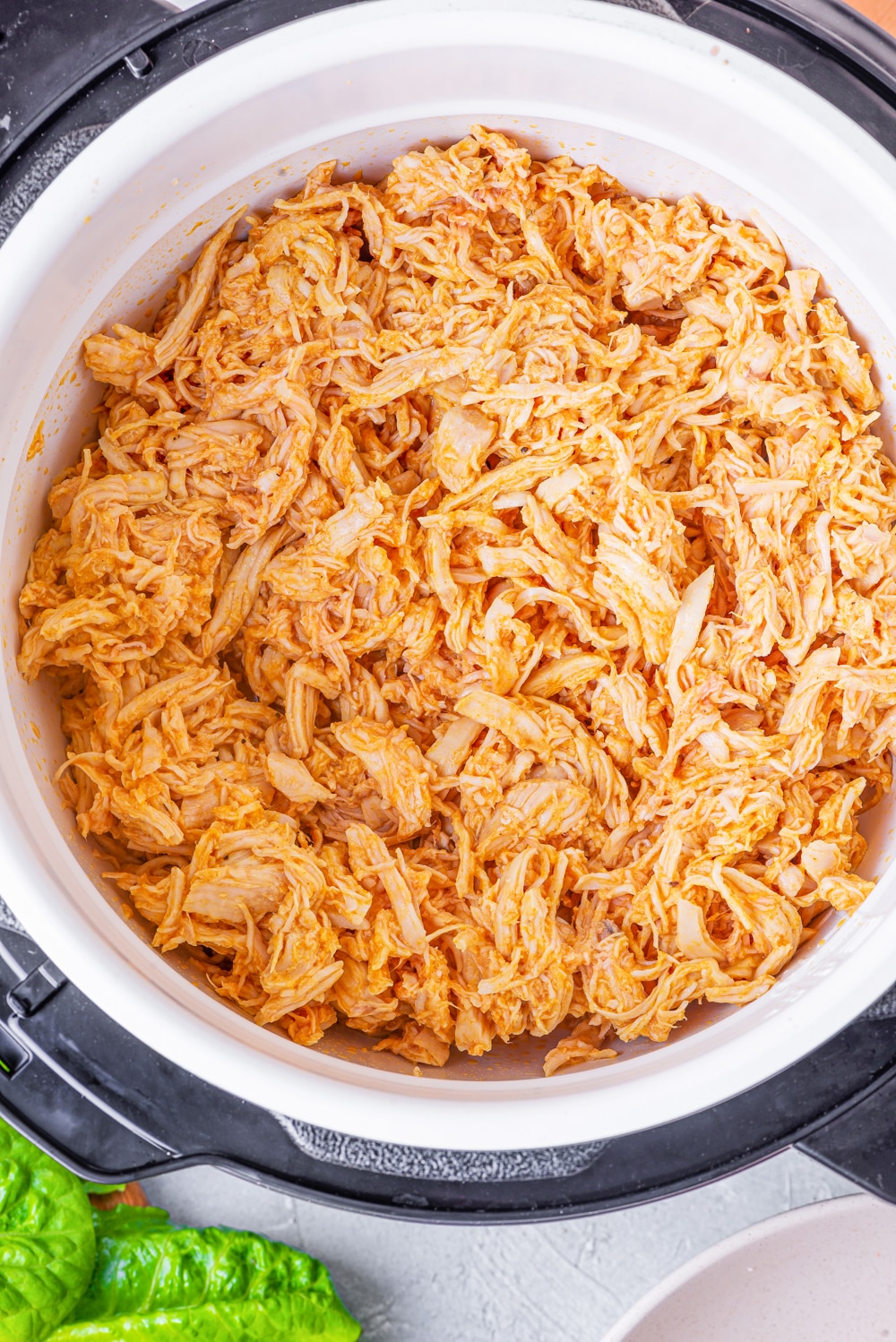 Buffalo Chicken shredded in an instant pot.