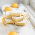 A stack of keto lemon bars on a serving plate.