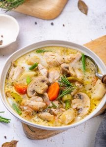 Chicken Stew In a bowl on a white table.
