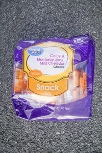 A bag of multi-flavored cheese snacks.