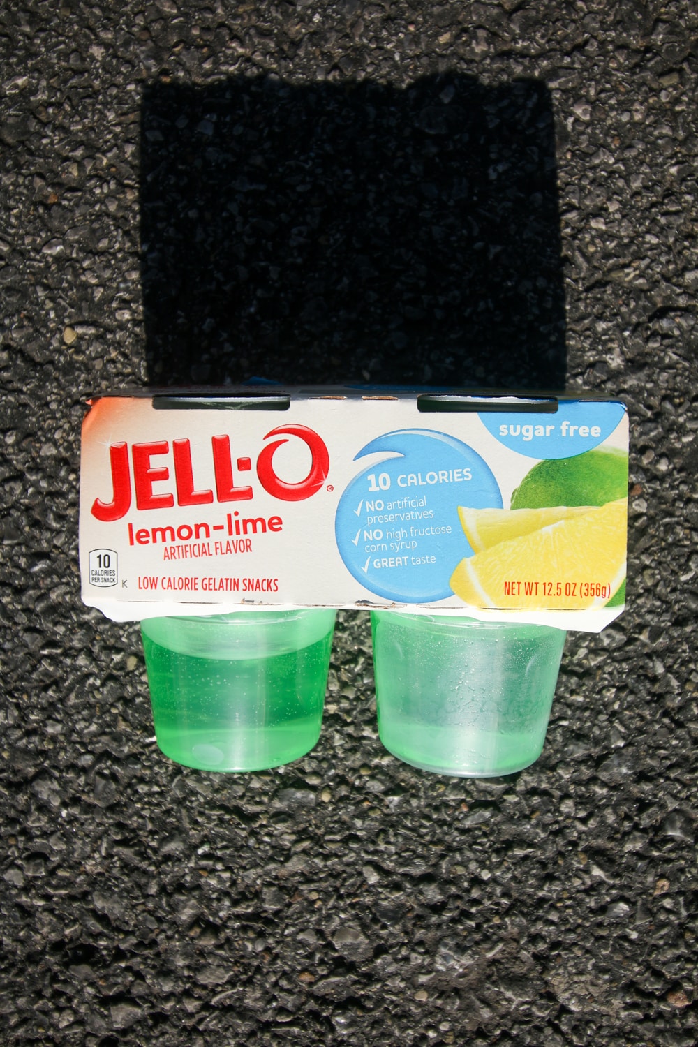 A package of 4 lemon lime sugar free Jello's.