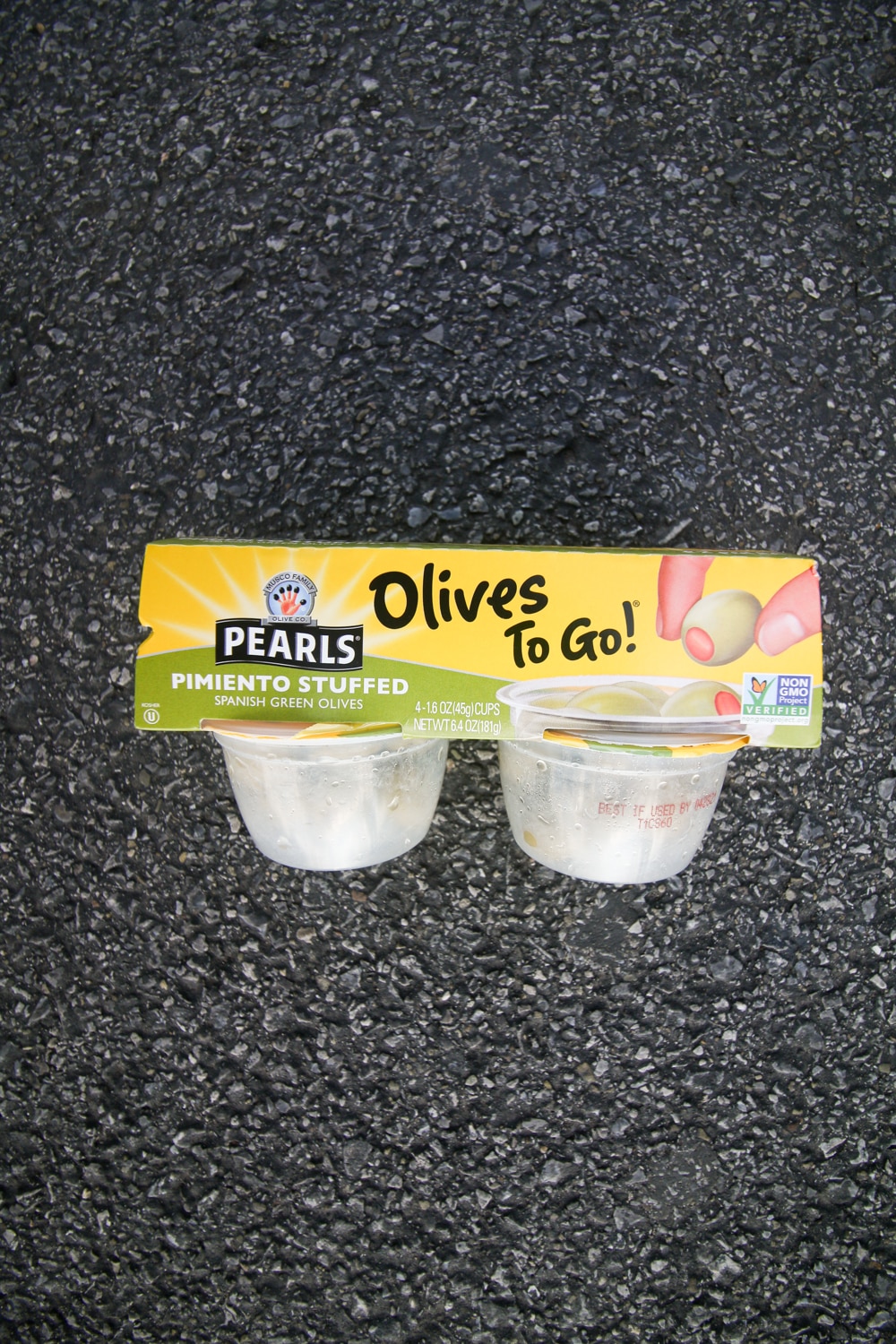 A package of olive snack packs.
