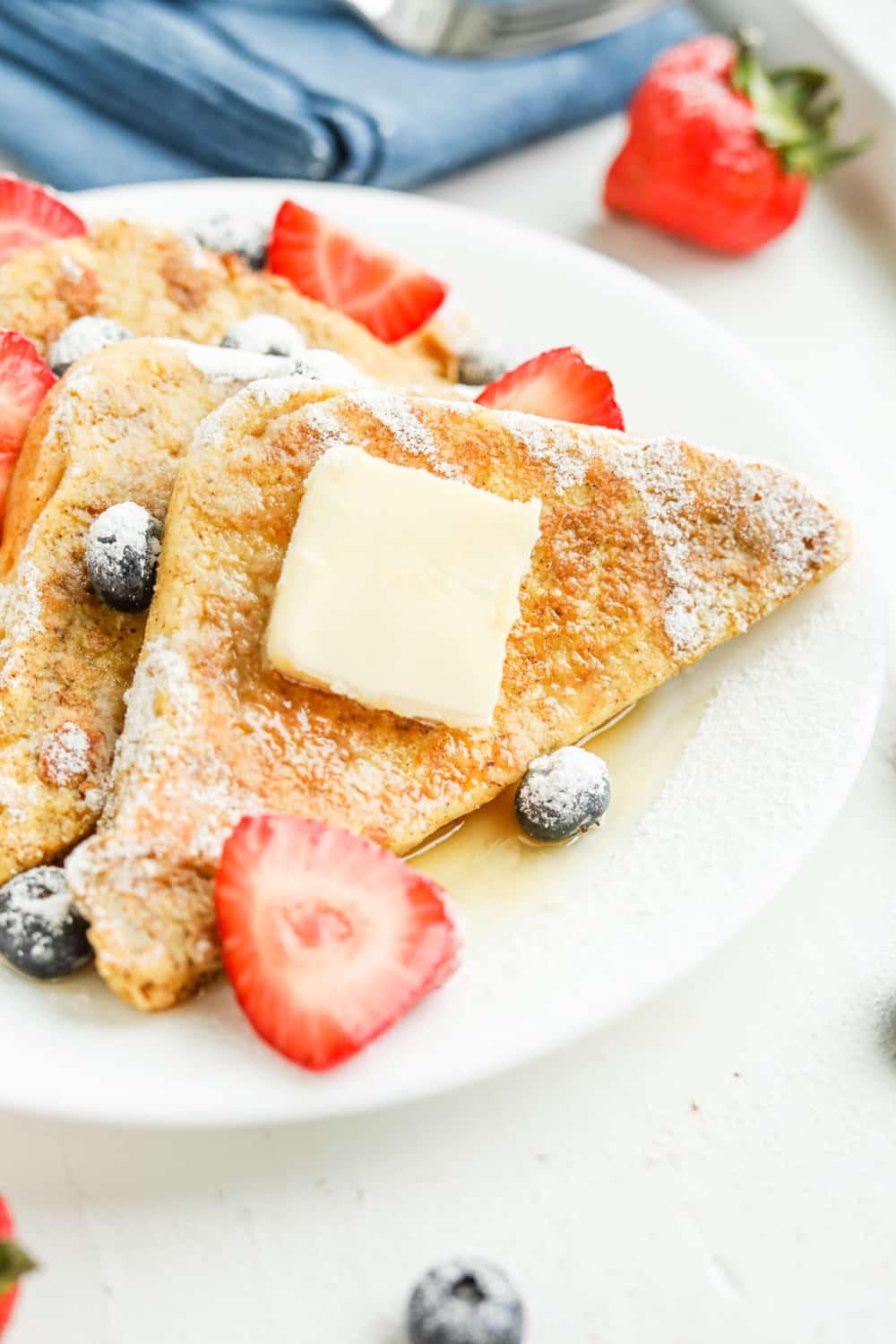 French toast on a white plate.