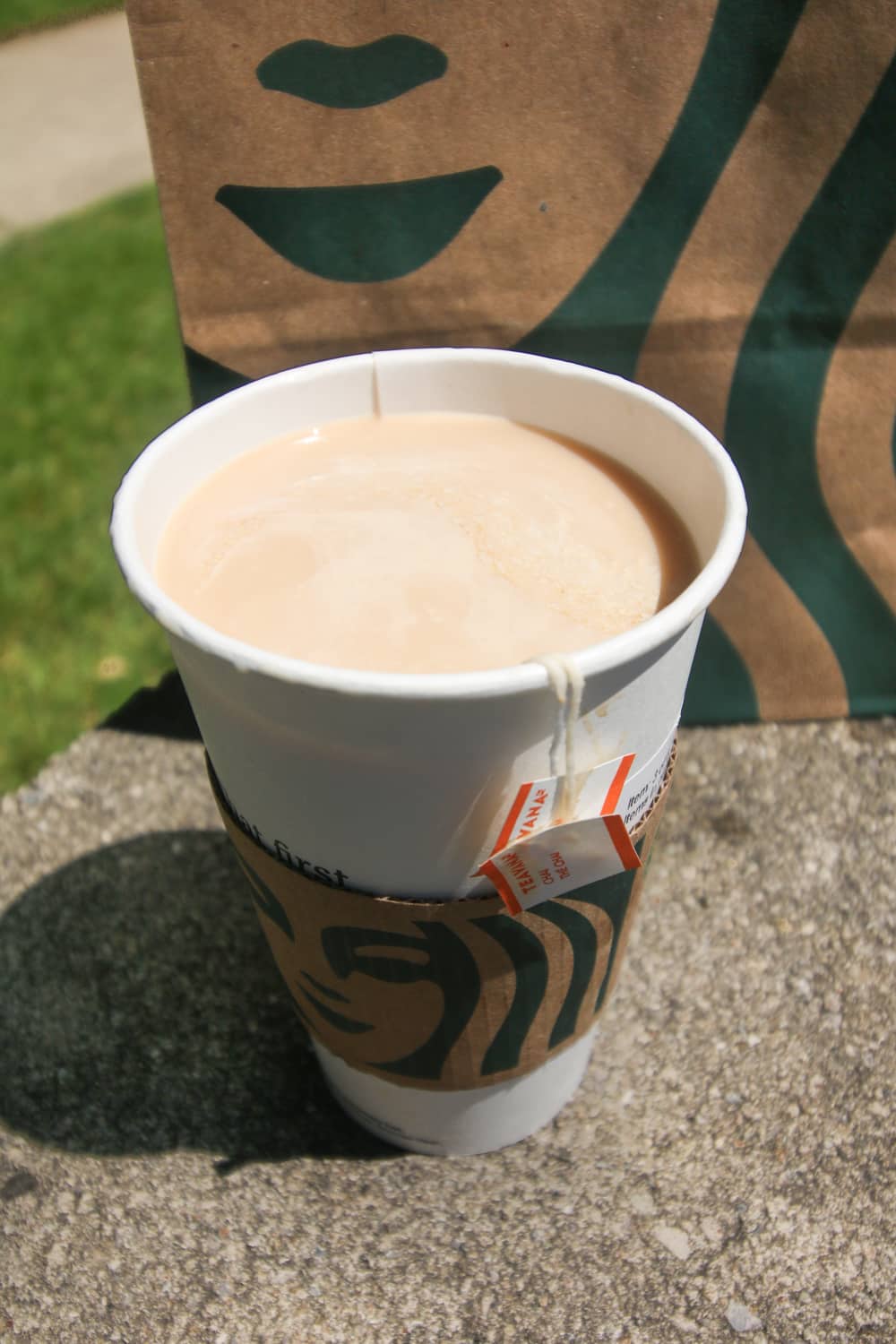 Chai tea in a paper cup.