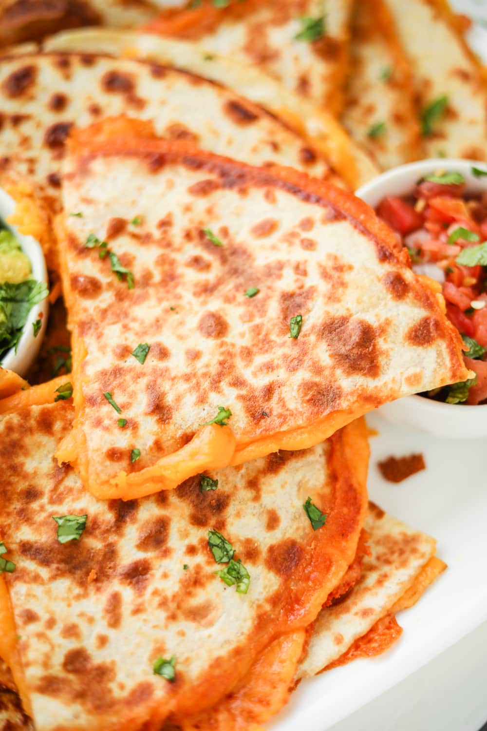 Quesadillas filled with cheese.