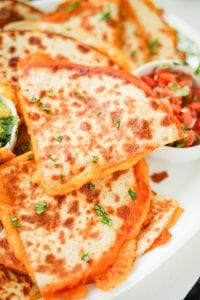 Cheese quesadillas on a plate.