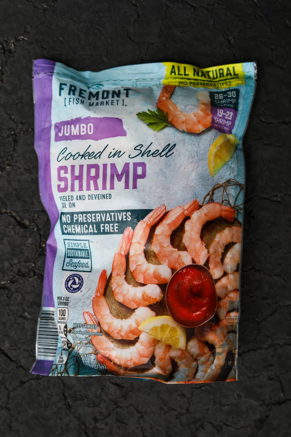 A large package of cooked shrimp.
