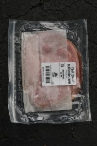 A bag full sliced deli ham.