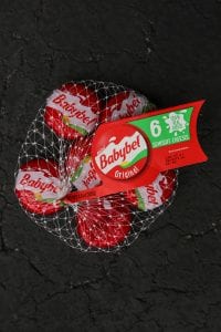 A bag of Babybel mini cheese wheels.