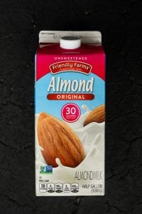 A container of almond milk.