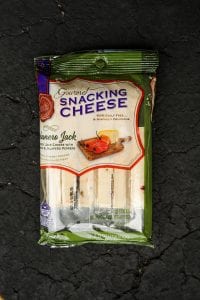 A package of pepper jack string cheese.