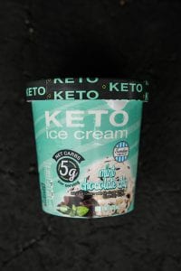 A pint of mint chocolate chip keto ice cream.
