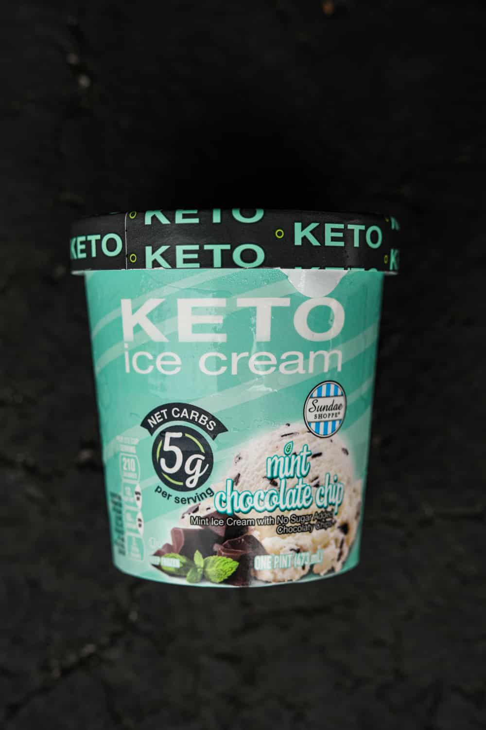 A pint of mint chocolate chip keto ice cream.