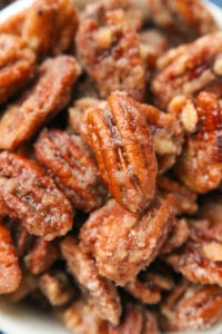 Candied pecans piled on top of one another.