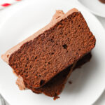 Slices of chocolate yogurt cake on a white plate.