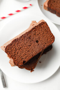 Slices of chocolate yogurt cake on a white plate.