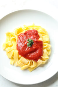 A plate of keto pasta and tomato sauce.