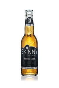 A bottle of Skinny Brands premium lager.