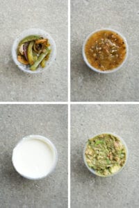 A small plastic cup of fajita veggies in the top left or the small plastic cup of salsa Verde in the top right. The bottom right is a small plastic cup of sour cream and asked that a small plastic cup of guacamole.