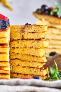 The inside of a stack of eight cream cheese pancakes.